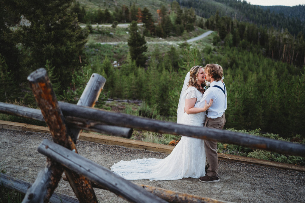 Colorado elopement photographer captures bride and groom kissing after elopement ceremony