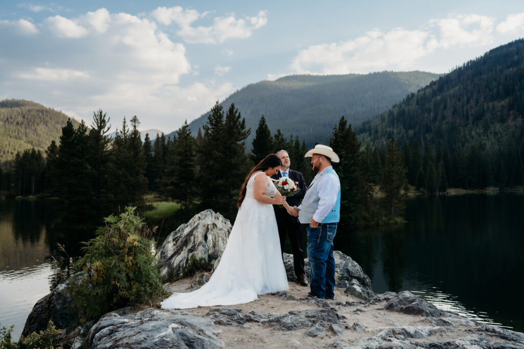 Colorado elopement photographer captures couple reading vows to one another