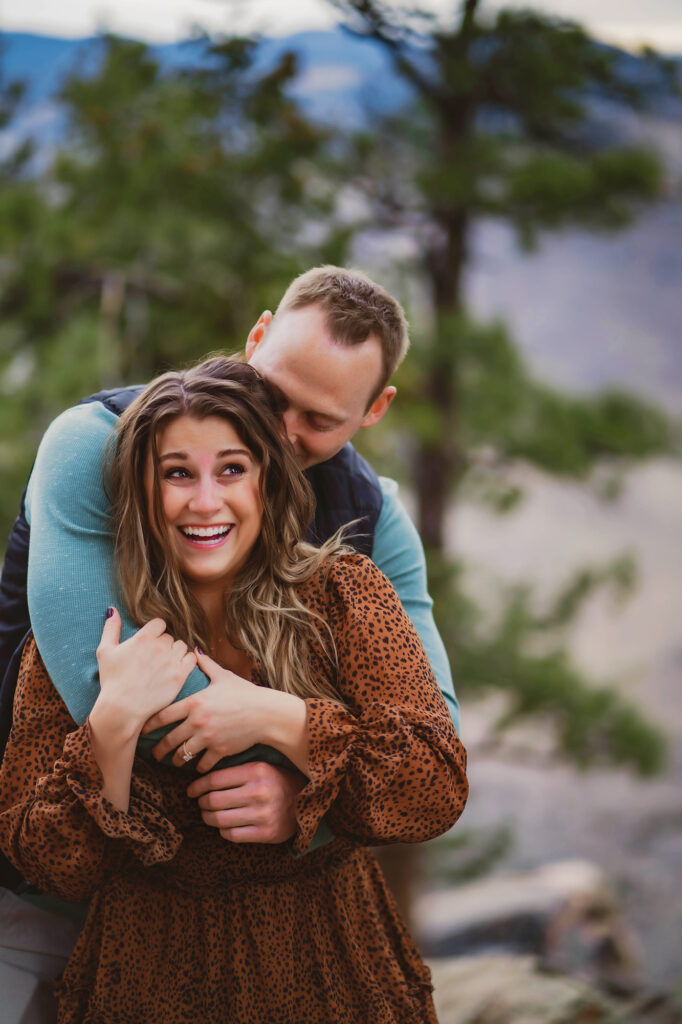 Colorado elopement photographer captures man kissing woman's neck