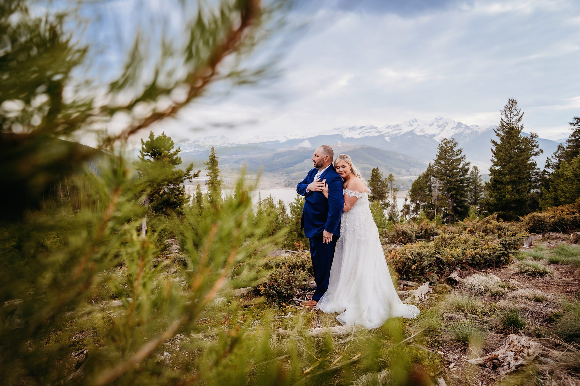 Colorado elopement photographer captures bride and groom embracing after intimate elopement