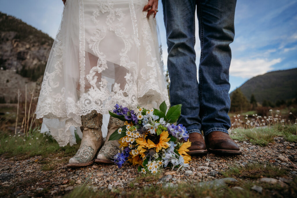 Denver wedding photographer captures bride and groom's shoes during bridal portraits