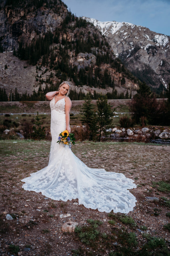 Denver wedding photographer captures bride looking over shoulder during bridal portraits