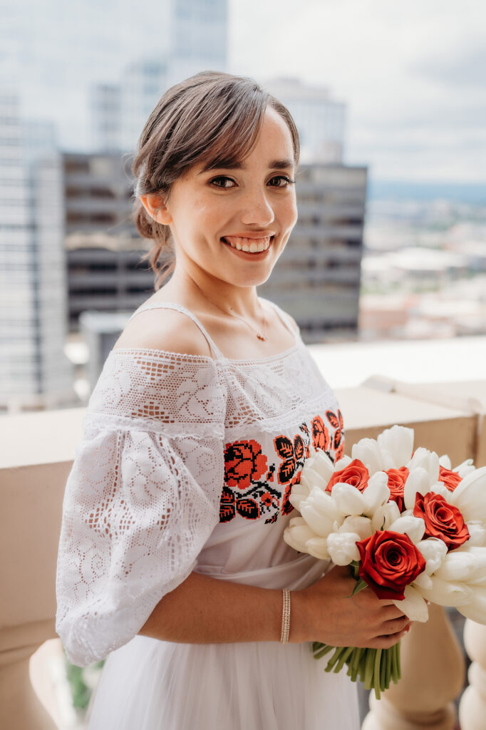 Colorado elopement photographer captures bride holding bouquet before elopement ceremony