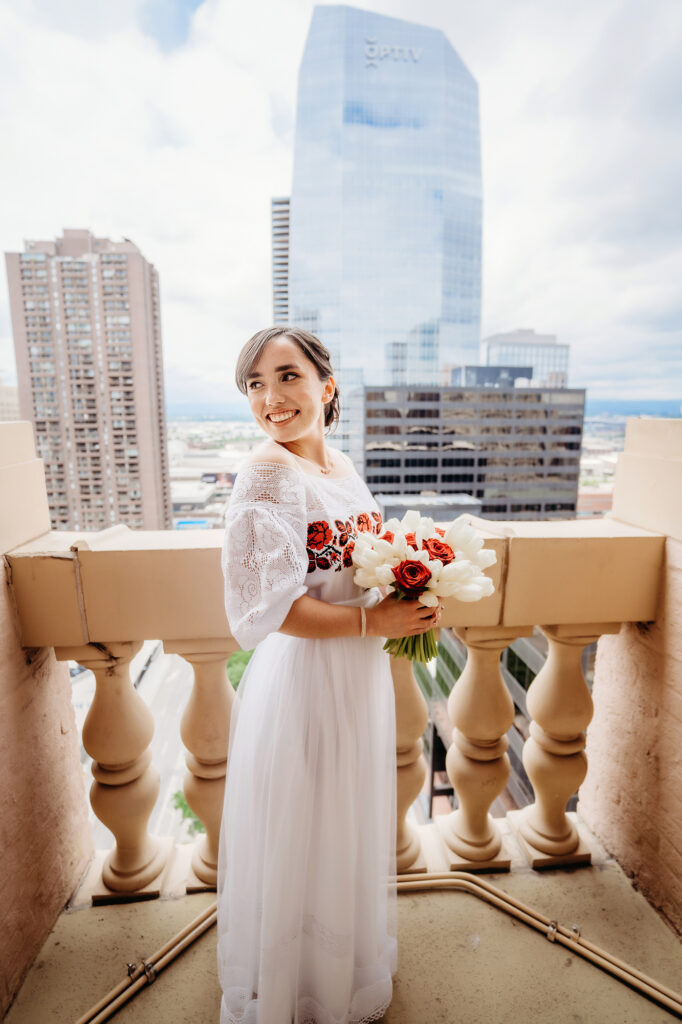 Colorado elopement photographer captures bride wearing wedding dress holding bridal bouquet