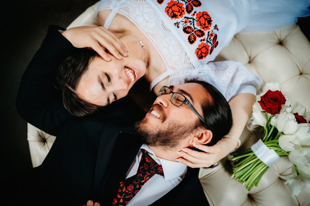 Colorado elopement photographer captures bride and groom lying together