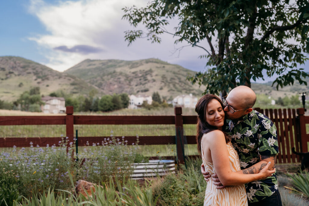 Denver wedding photographer captures couple kissing during destination Colorado engagements