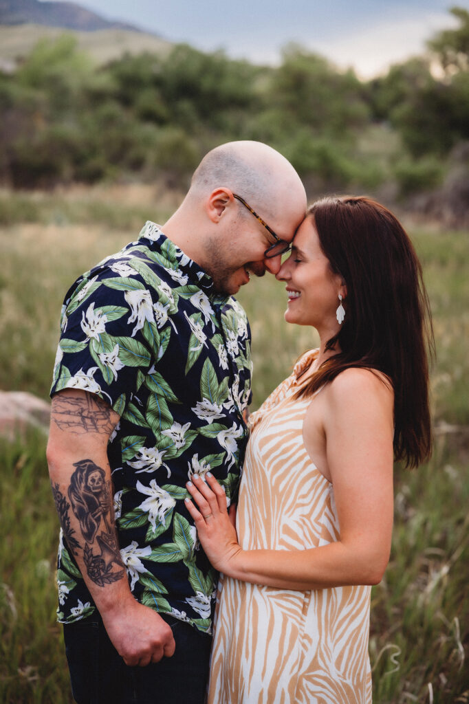 Denver wedding photographer captures couple touching foreheads during destination engagement photos