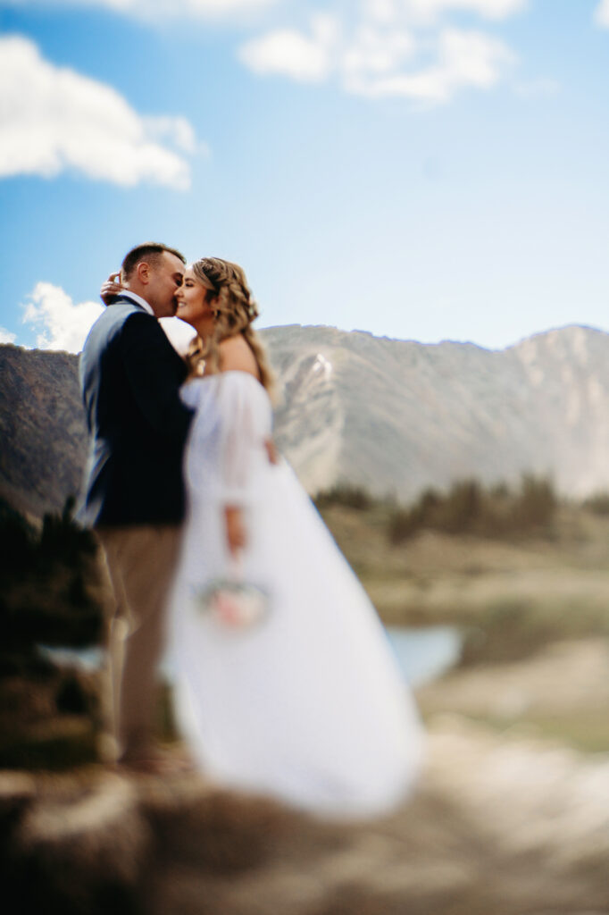 Colorado elopement photographer captures couple embracing 