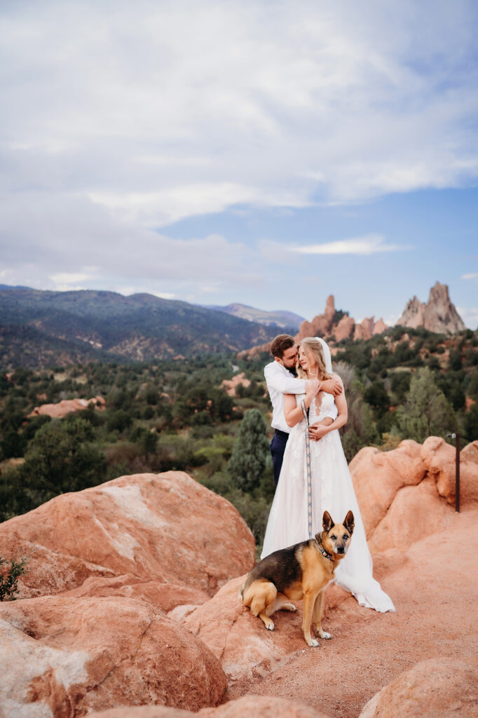 Colorado elopement photographer captures bride and groom hugging during outdoor bridal portraits