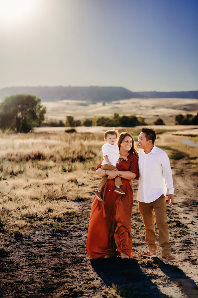 Denver Family Photographer captures family walking together smiling