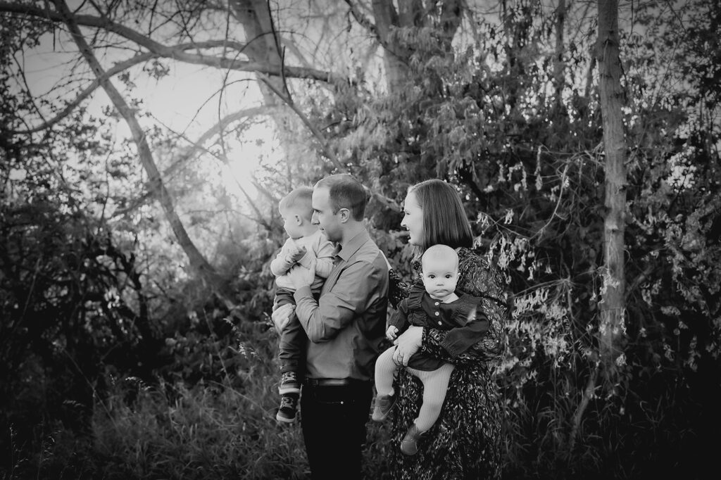 Denver family photographers capture black and white portrait of family during outdoor portraits