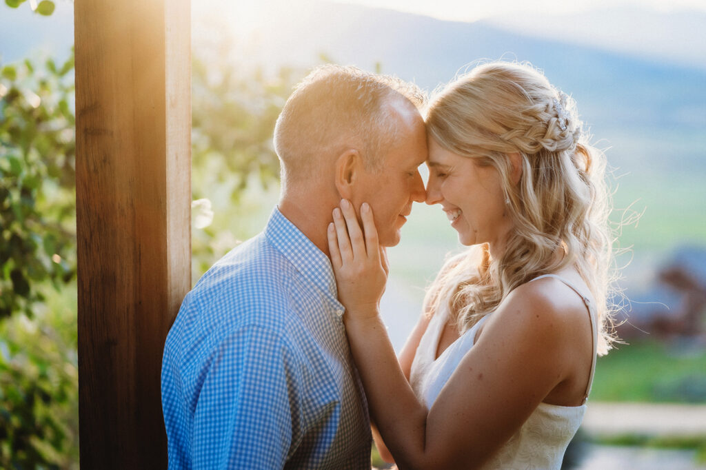 Colorado elopement photographer captures man and woman touching foreheads