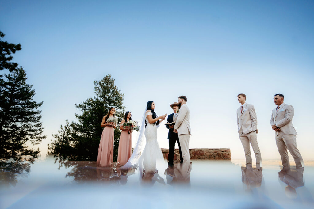 Colorado elopement photographer captures bride and groom during micro wedding surrounded by family