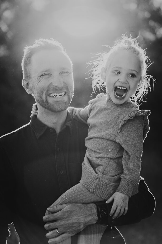 Denver family photographers capture father holding child