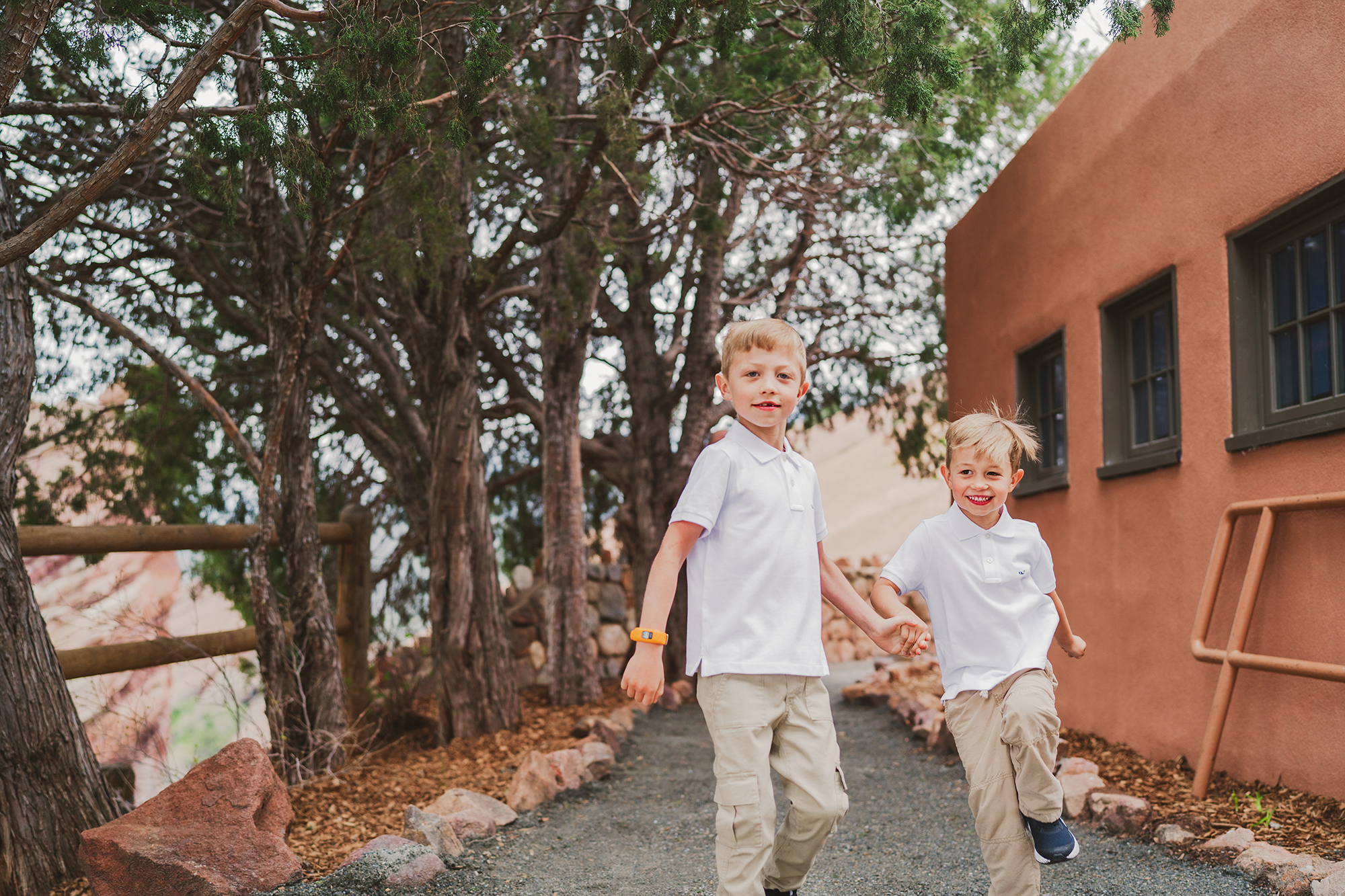 Denver Family Photographers capture young boys running together