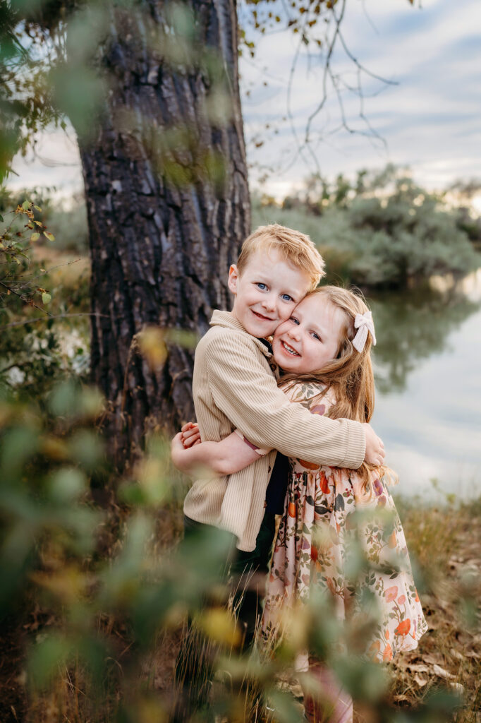 Denver family photographers capture brother hugging sister