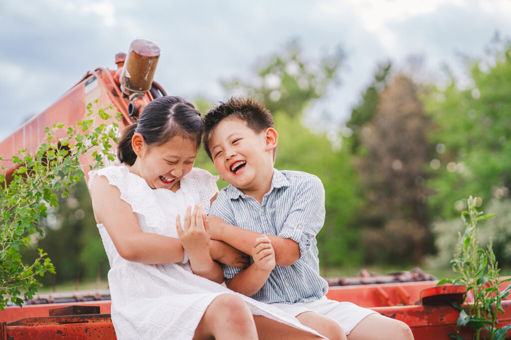 Denver family photographer captures brother and sister playing during morning family session
