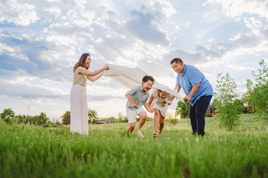 Denver family photographer captures family playing outdoors during family photos