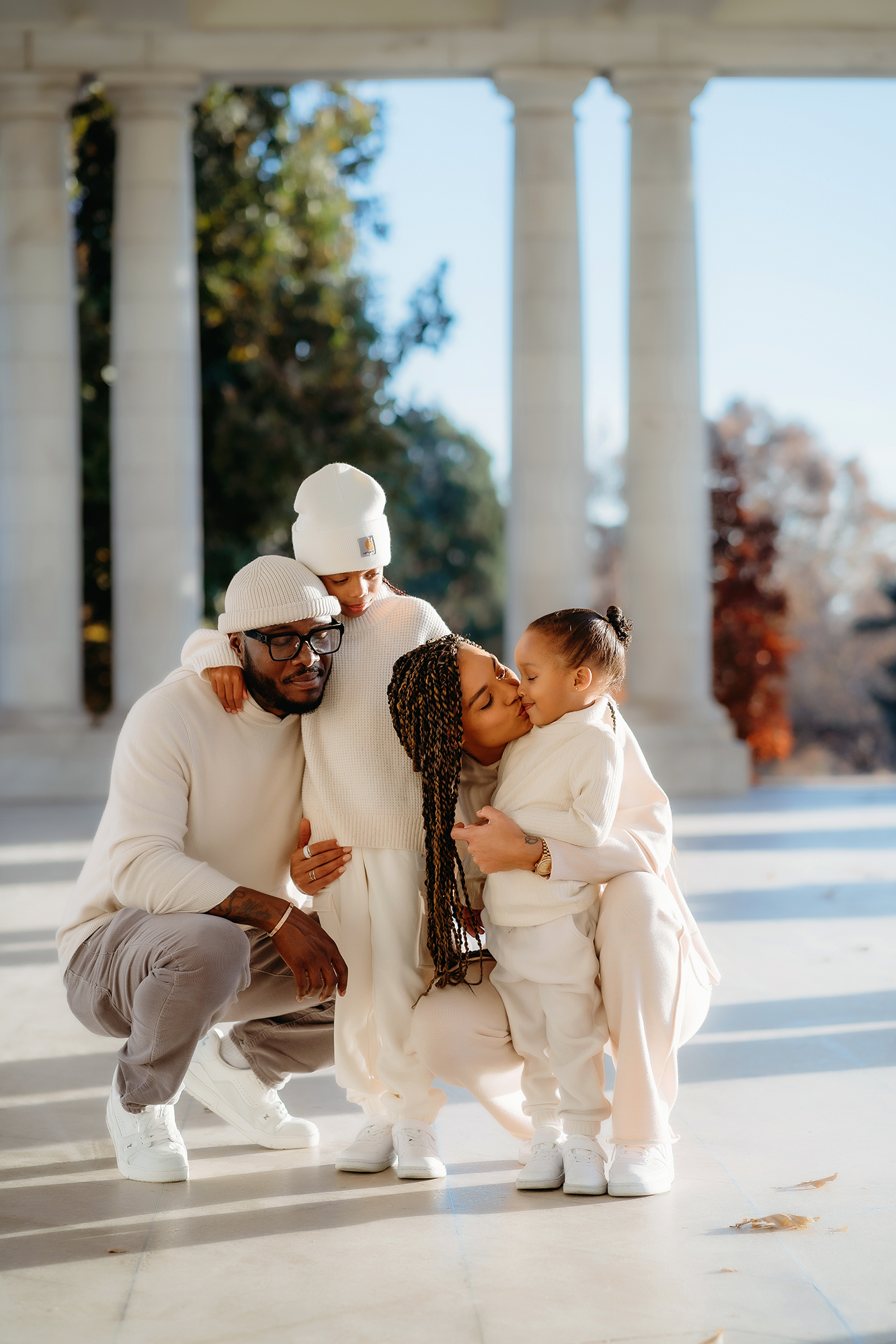 Denver family photographer captures family hugging one another