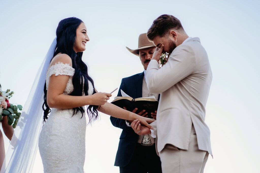 Colorado elopement photographer captures groom crying during vows
