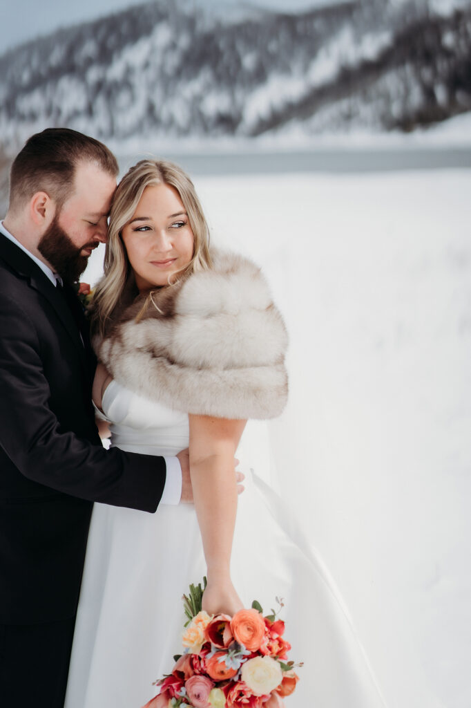 Colorado wedding photographer captures groom placing forehead against bride's hair
