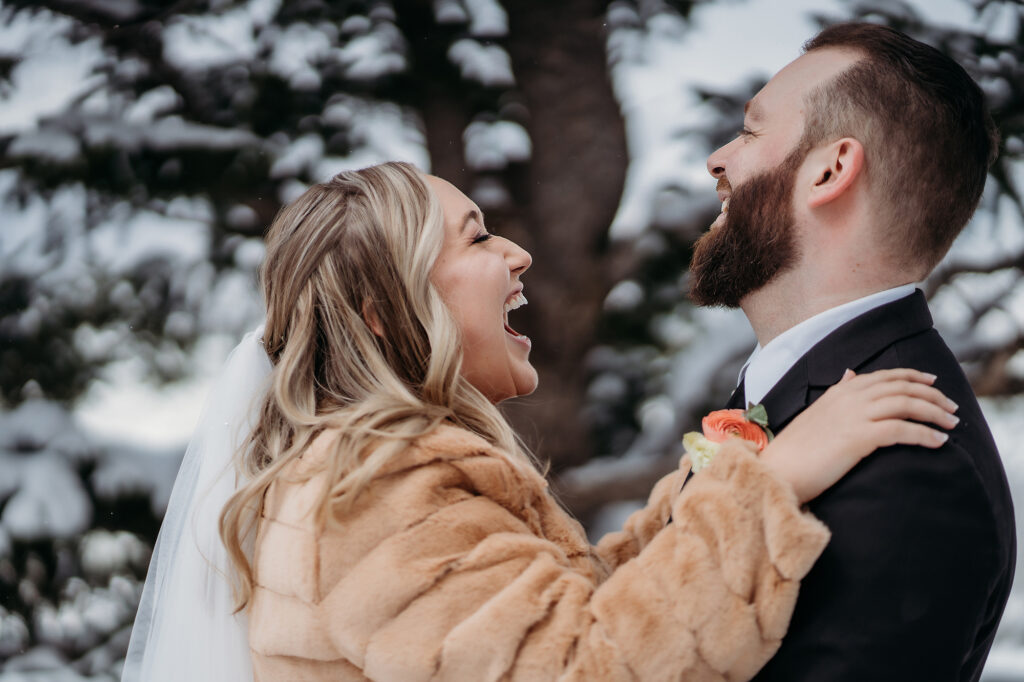 Colorado wedding photographer captures couple laughing after Colorado wedding