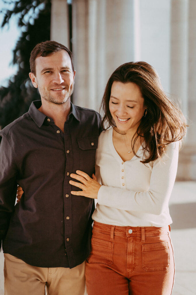 Colorado Family Photographer captures mother and father laughing and walking together