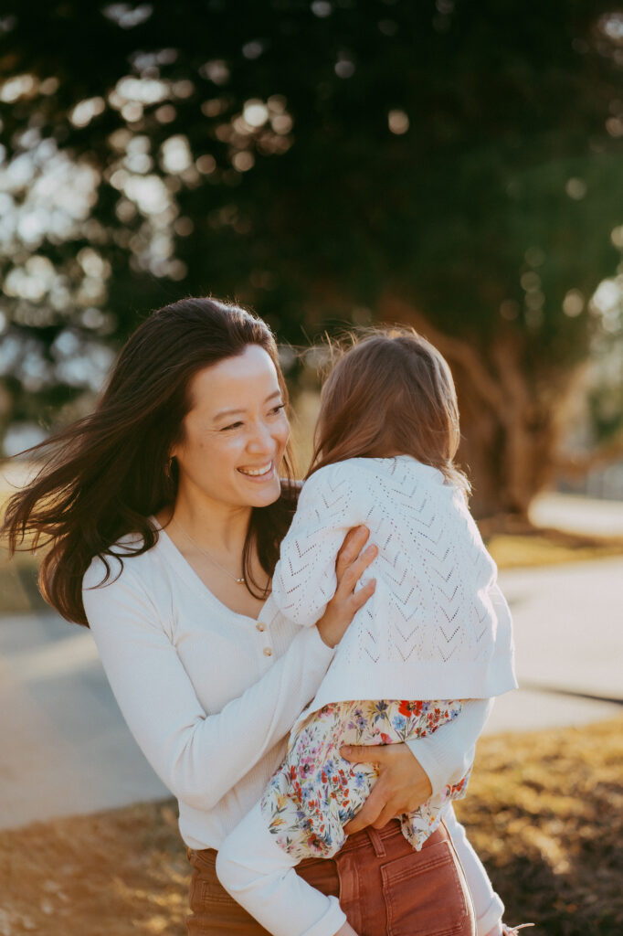 Colorado Family Photographer captures mother hugging daughter