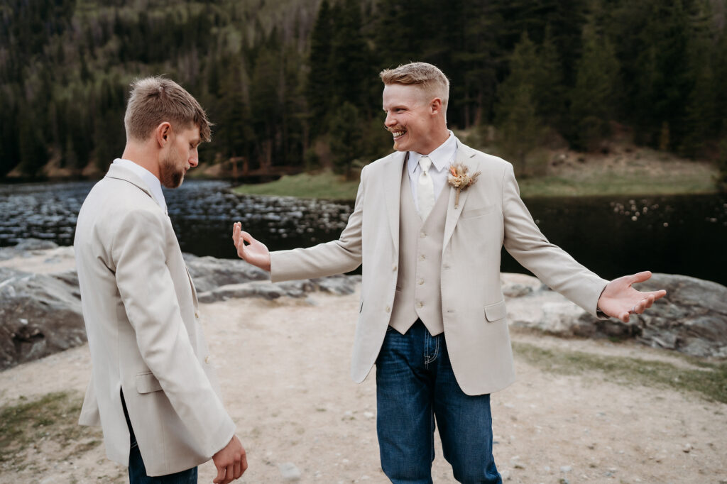 Colorado Elopement Photographer captures groom with groomsmen before adventurous Colorado elopement