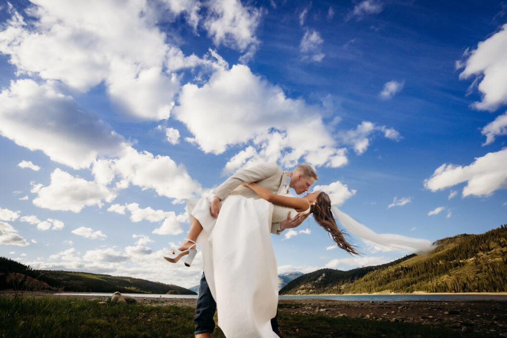 Colorado Elopement Photographer captures bride and groom dip kiss after adventurous Colorado elopement