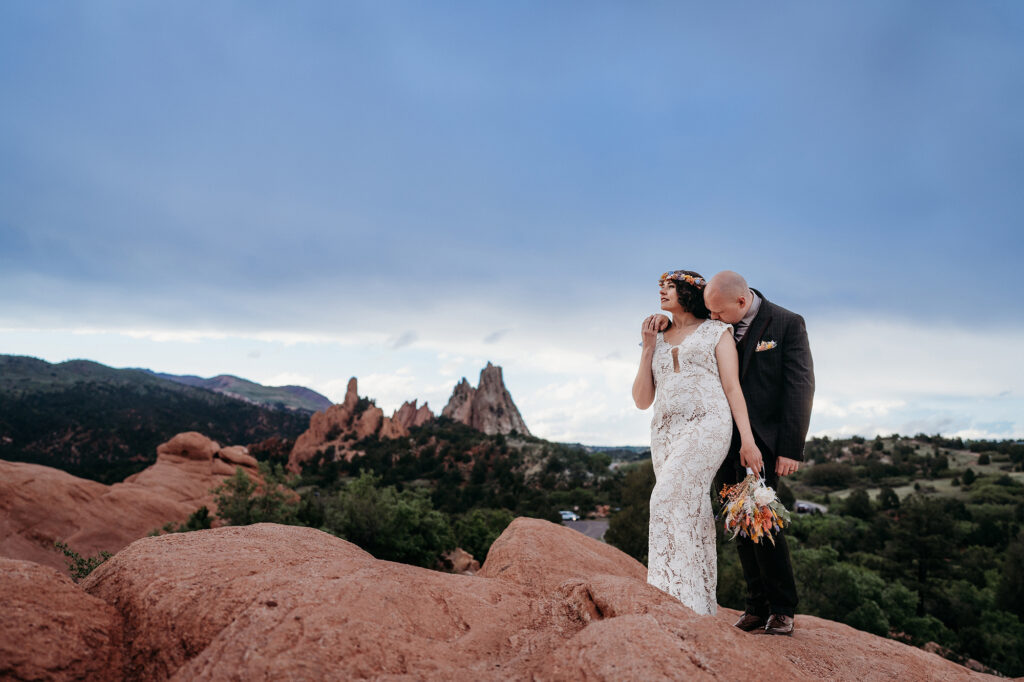 Denver Wedding Photographer captures bride and groom at top of Garden of the Gods