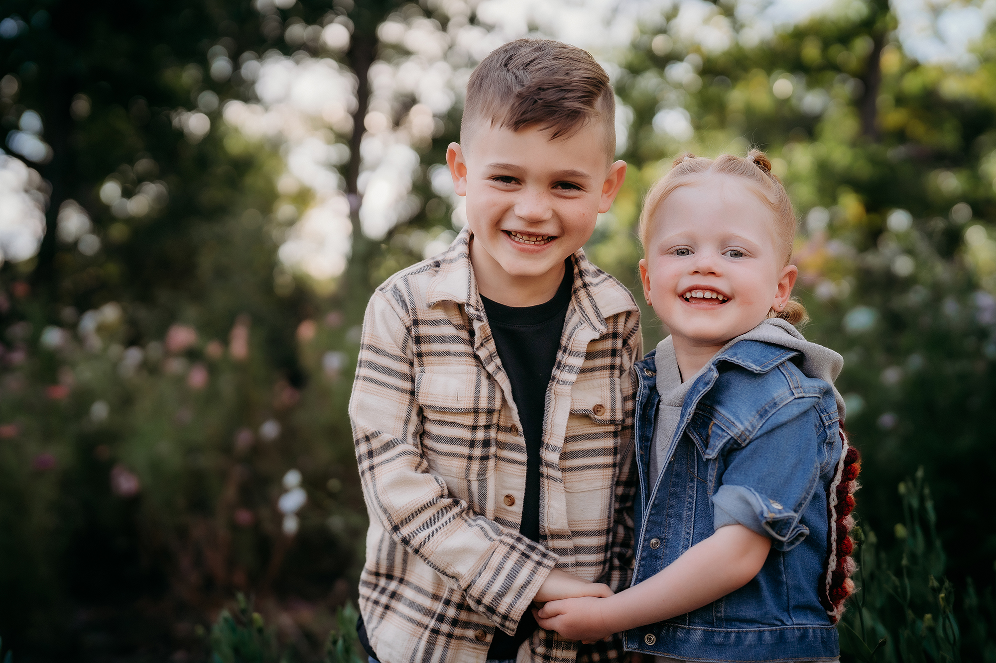 Denver Family Photographer captures young children smiling together