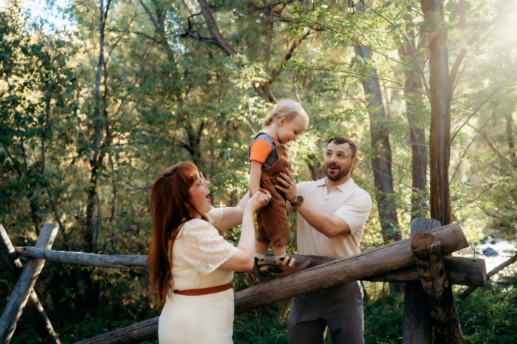 Denver Family Photographer captures young family playing outdoors together