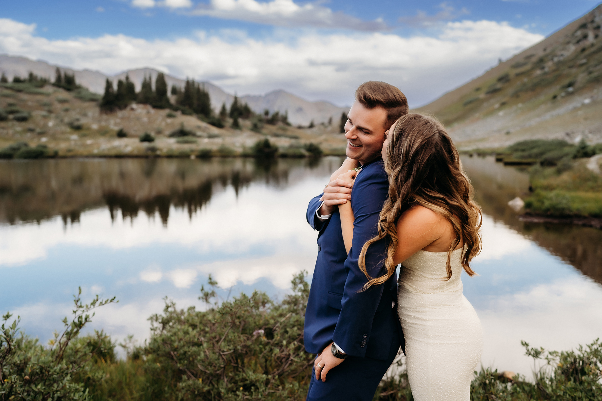 Colorado Elopement Photographer captures bride kissing groom's cheek