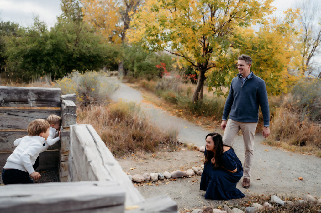 Denver Family Photographer captures parents playing with boys during lifestyle family photos