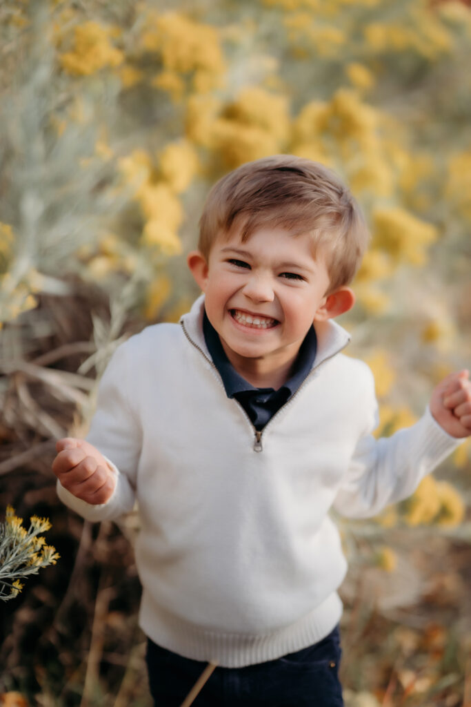 Denver Family Photographer captures young boy cheesing at camera