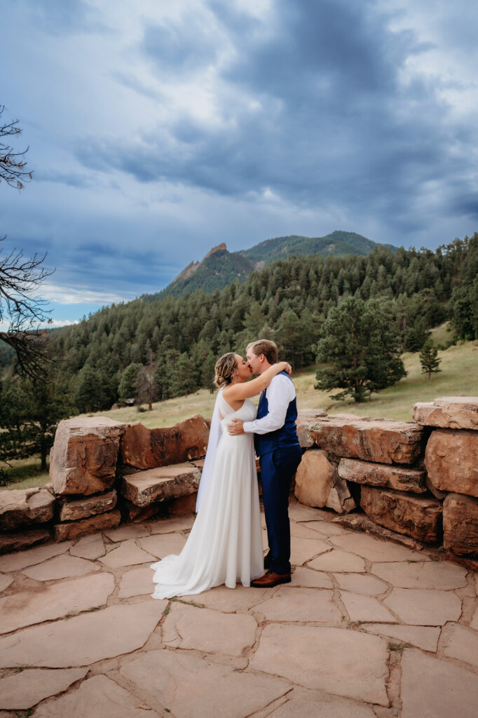 Colorado Elopement Photographer captures bride and groom kissing after ceremony