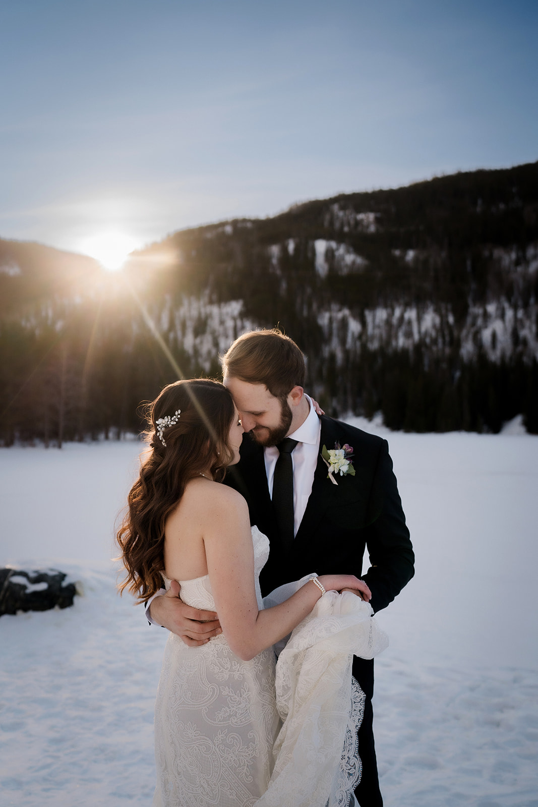 Colorado Elopement Photographer captures bride and groom touching foreheads and dancing together