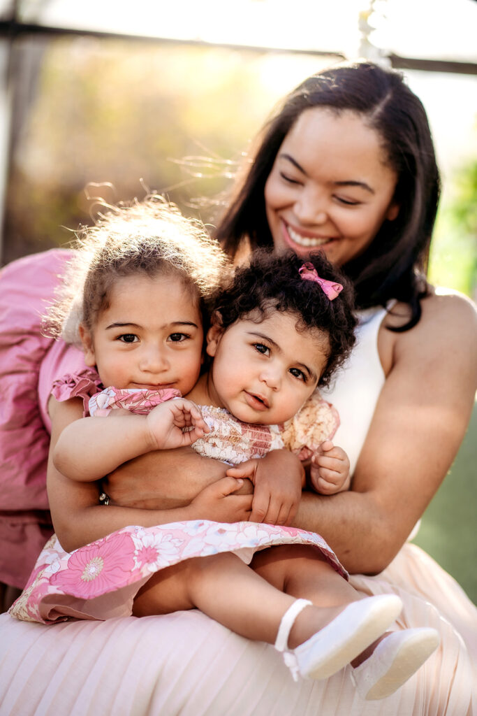 Denver Family Photographer captures mother holding children and laughing