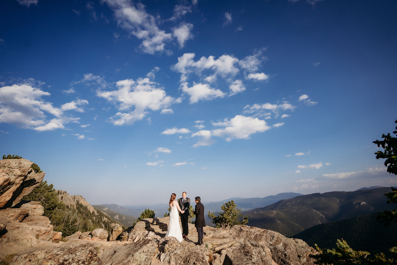Surrounded by blue skies and mountain peaks, they say “I do” with nothing but nature and love as their witnesses.
