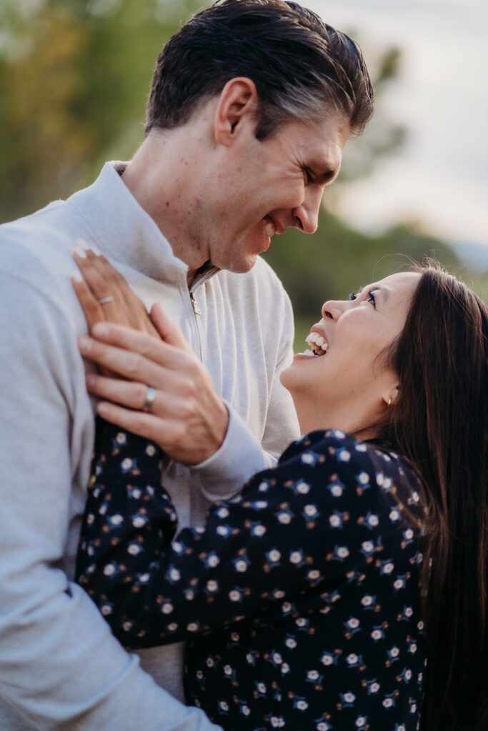 A close-up of joyful smiles between partners—these little moments of love are what make family outdoor pictures so special.